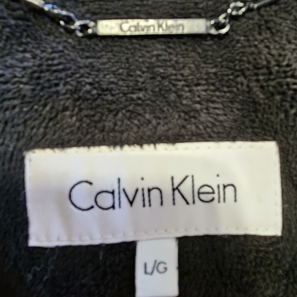 Calvin Klein women’s brown puffer jacket. Two front zip pockets. Size la… - Picture 15 of 15